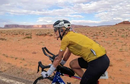Cyclist on RAAM at Monument Valley