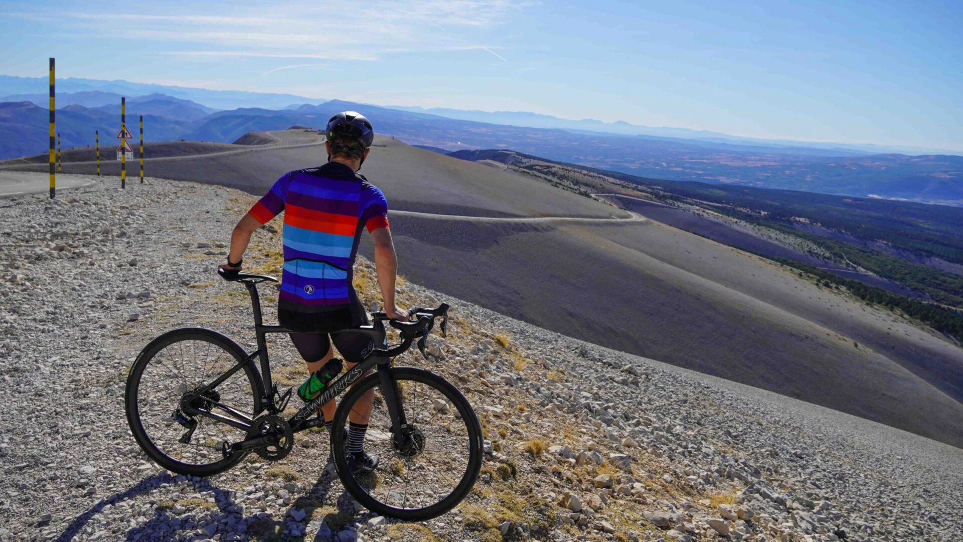 Cyclist admiring view on top of Mont Ventoux France
