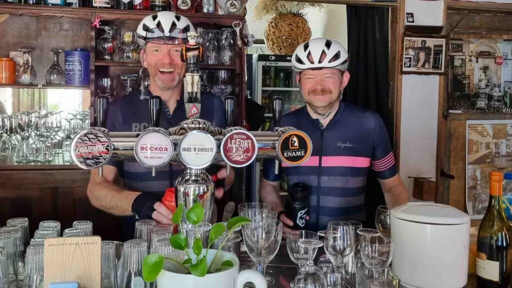 Two cyclists in a bar restaurant in Flanders