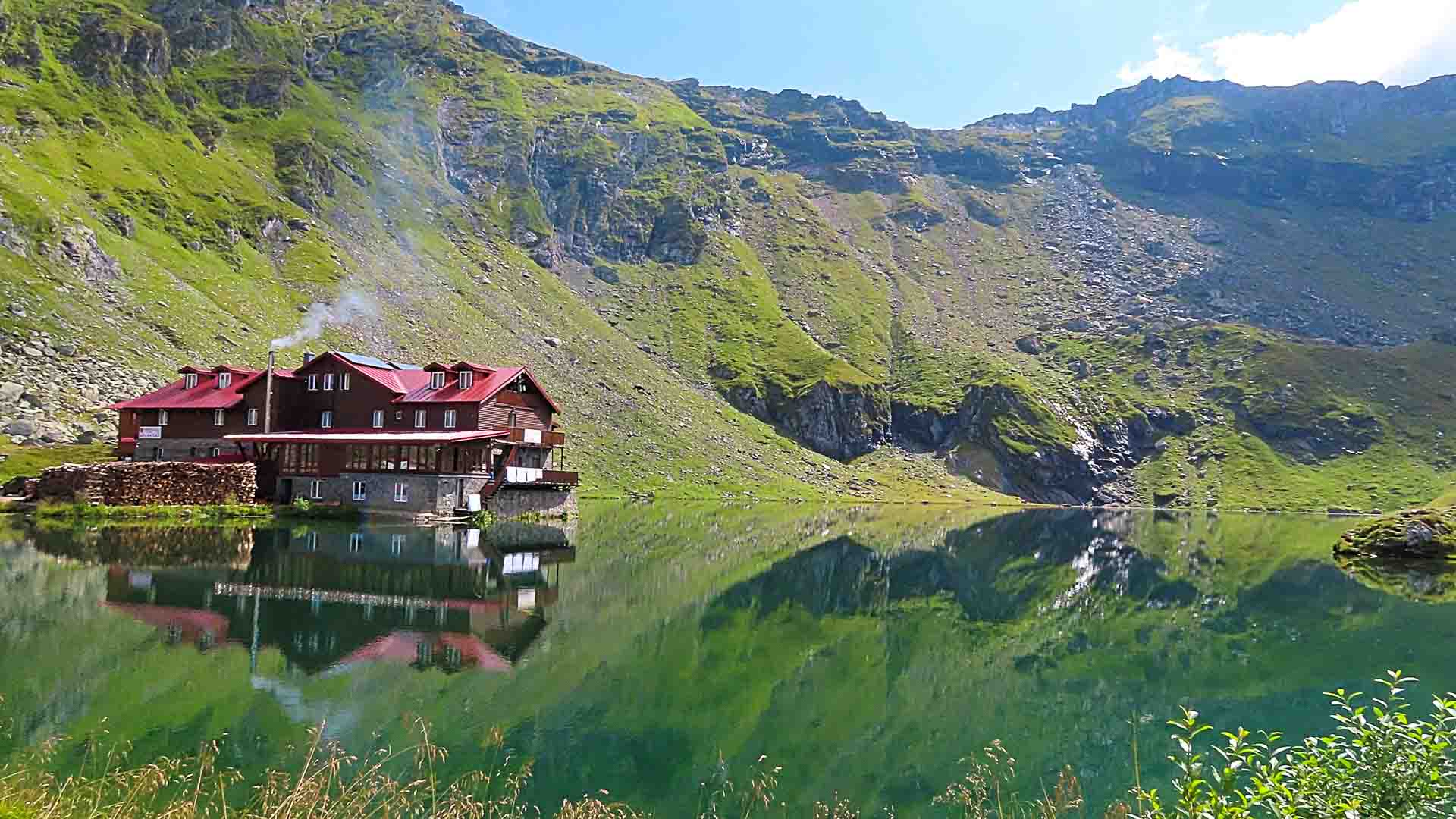 Transfagarasan mountain lake with mountains behind