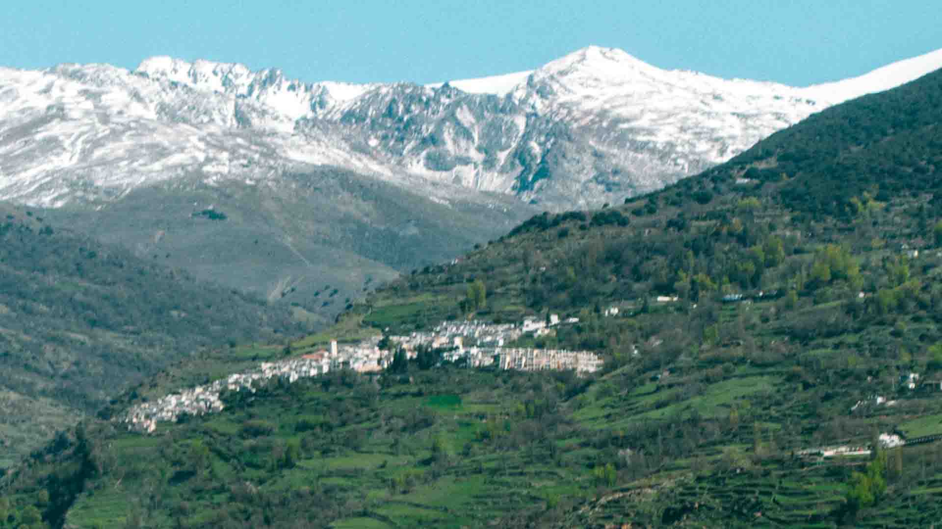 Village of Travelez with Sierra Nevada mountains in snow in background