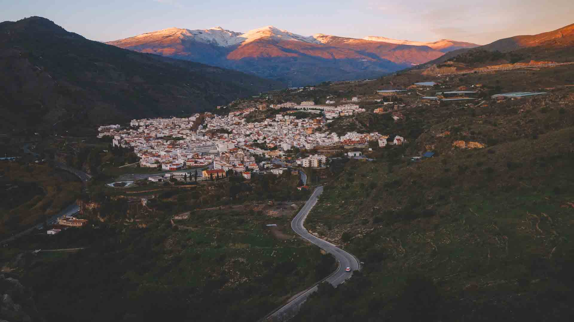 Mountain Village of Velez de Benaudalla with Sierra Nevada behind
