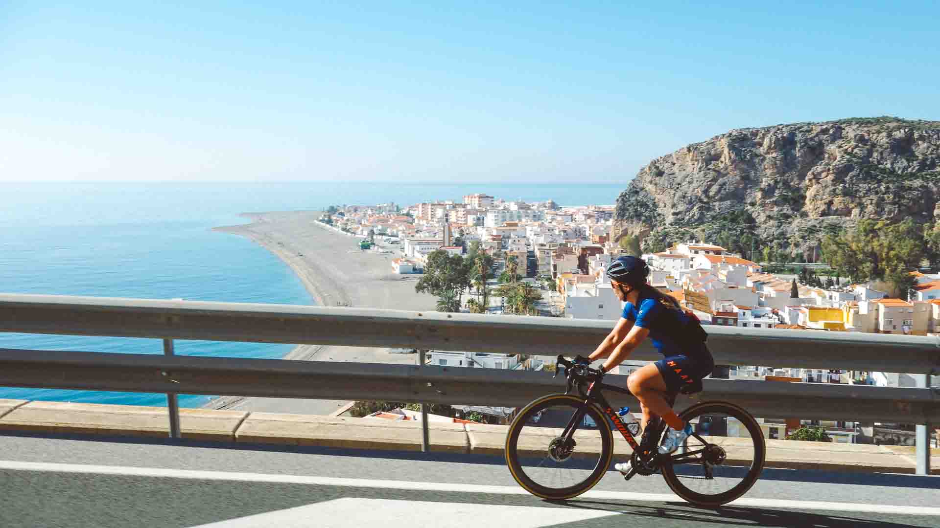 Woman cycling in Sierra Nevada, Spain