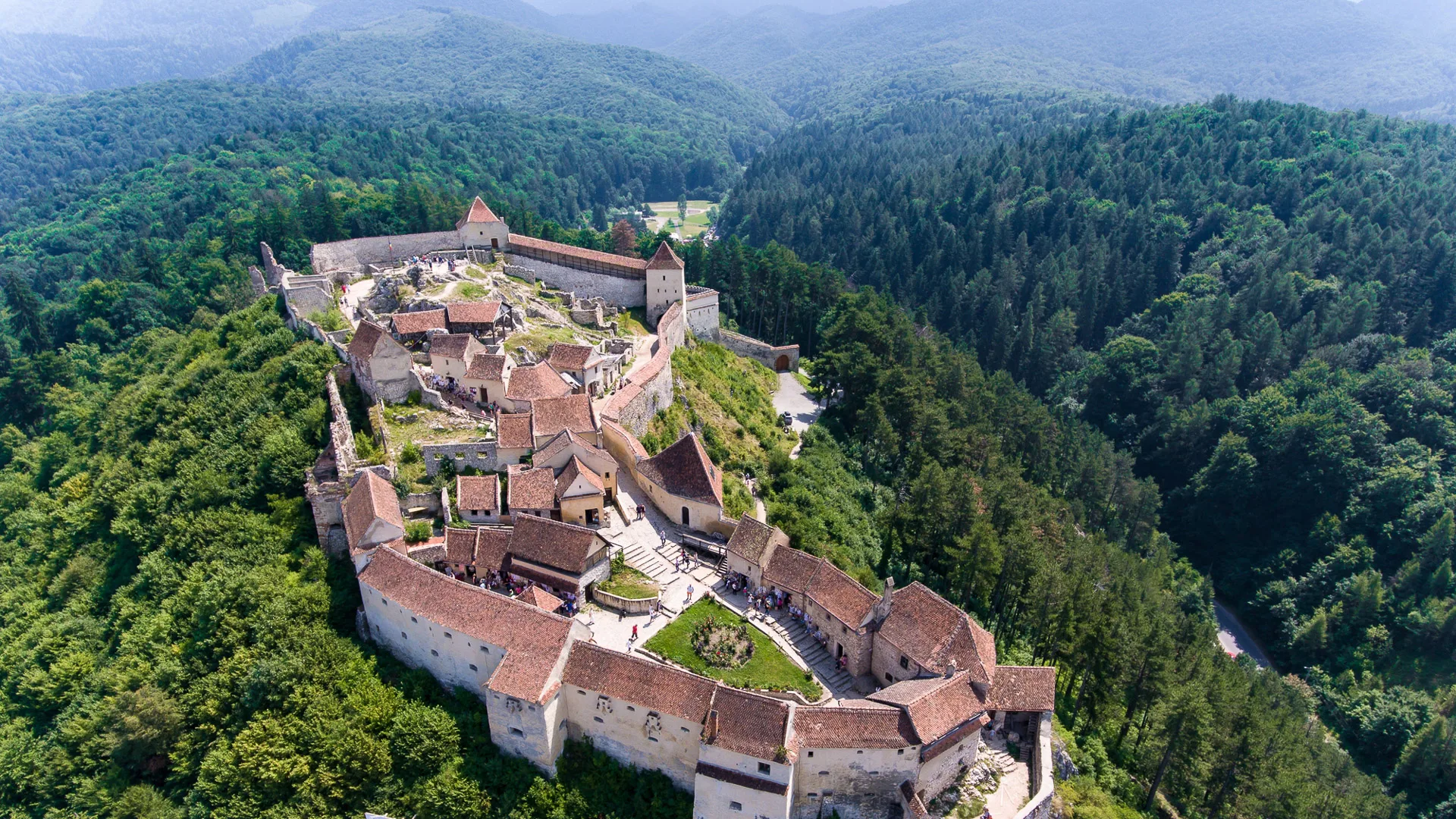 Aerial view of Rasnov Fortress overlooking Brasov in Transylvania, Romania