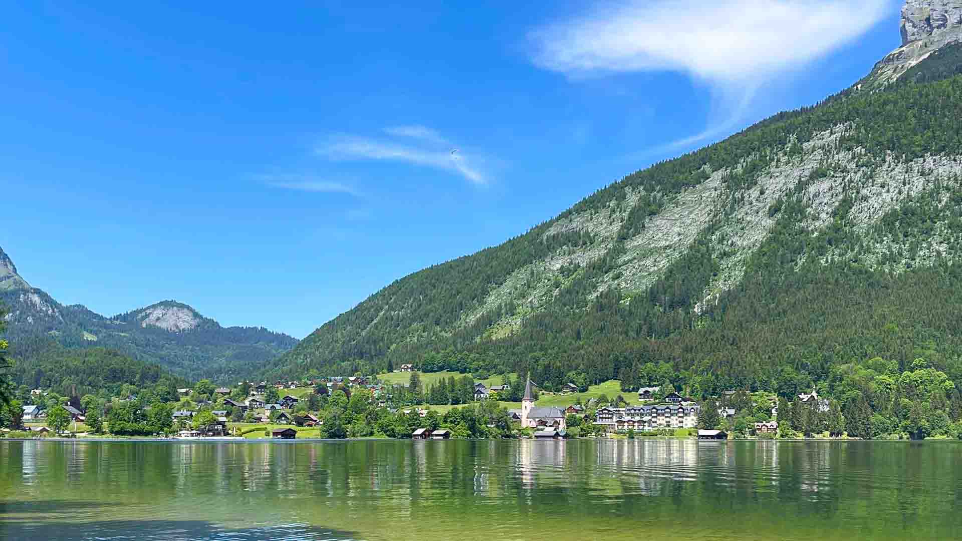 Lake with village and mountains in Austria