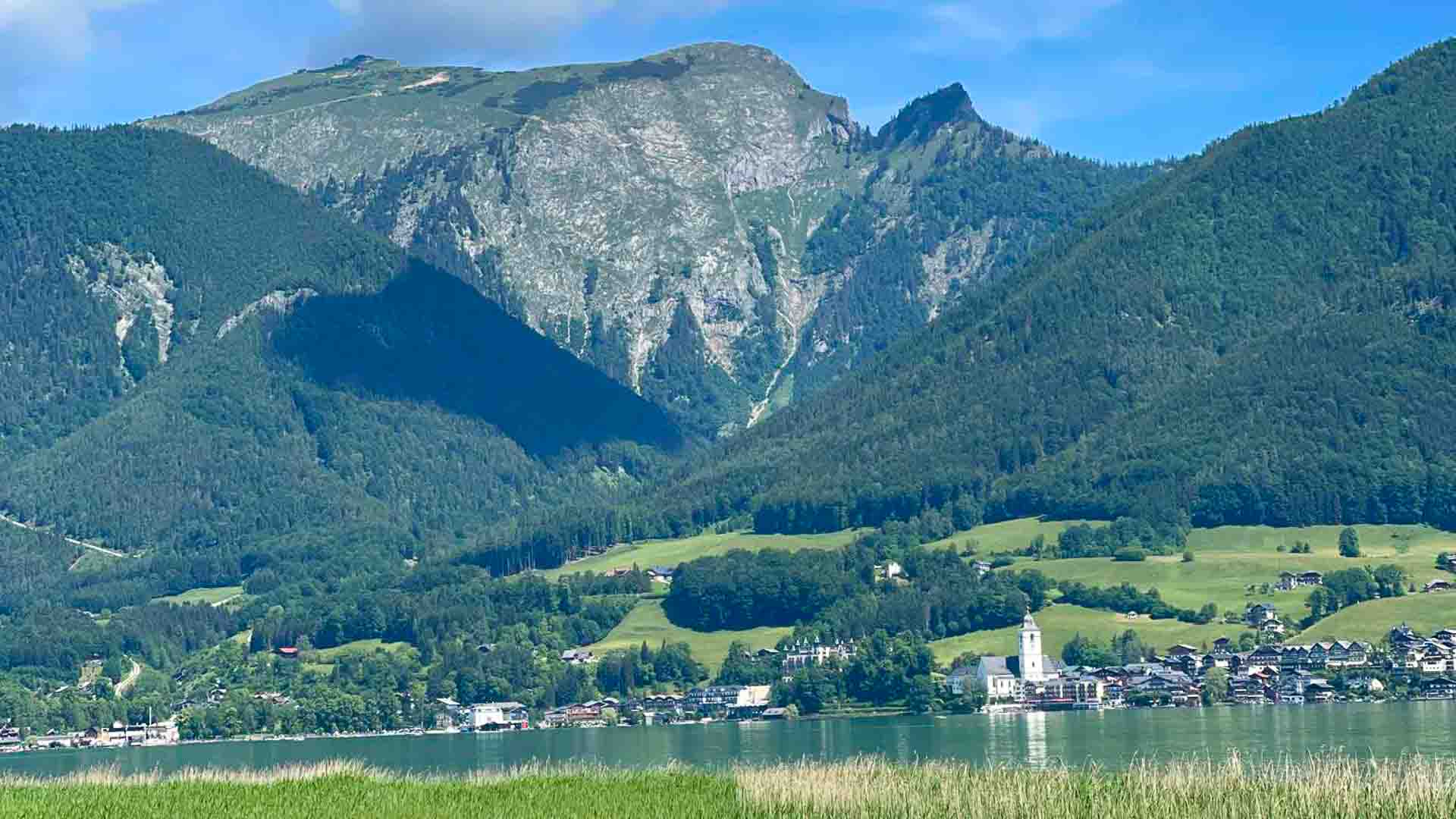 View across lake to Sankt Wolfgang during a cycling tour in Austria