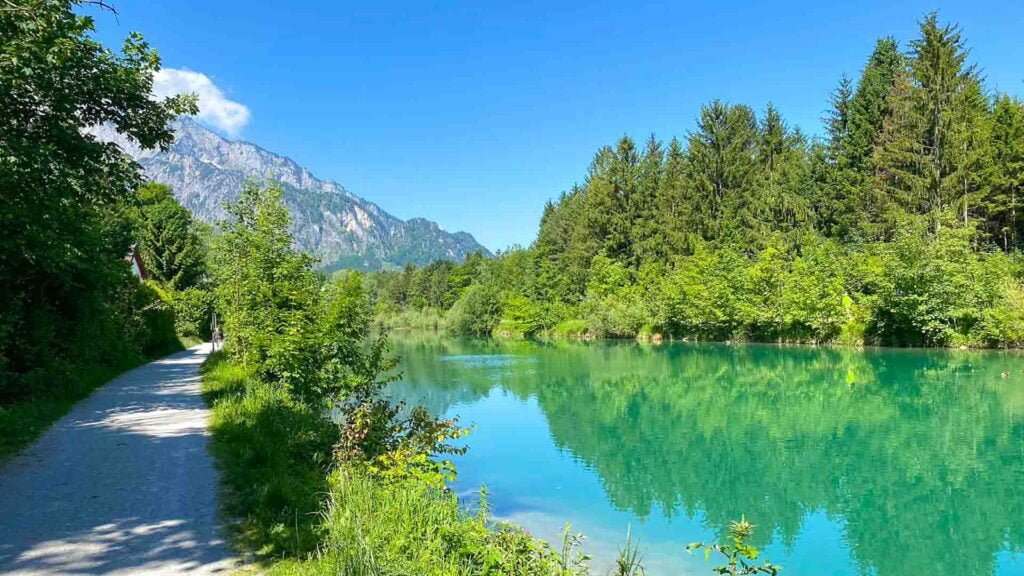 Trail by side of blue Salzach river