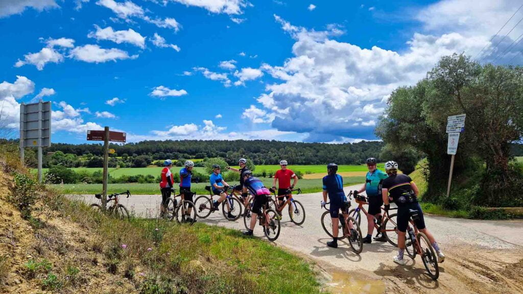 Group of cyclists on a cycling tour of Girona province in spring