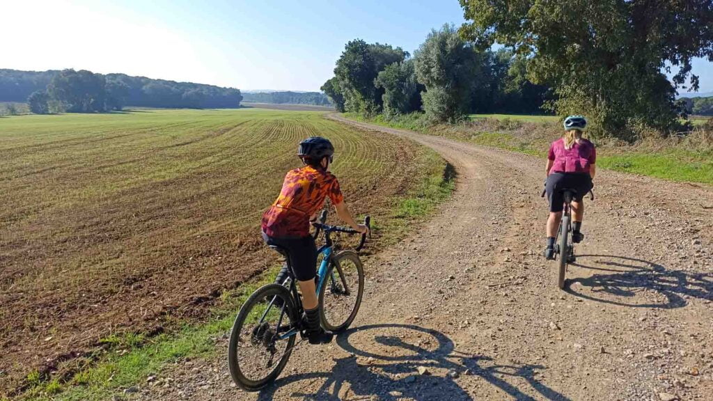 Two cyclists on a gravel trail near Girona in Catalonia Spain