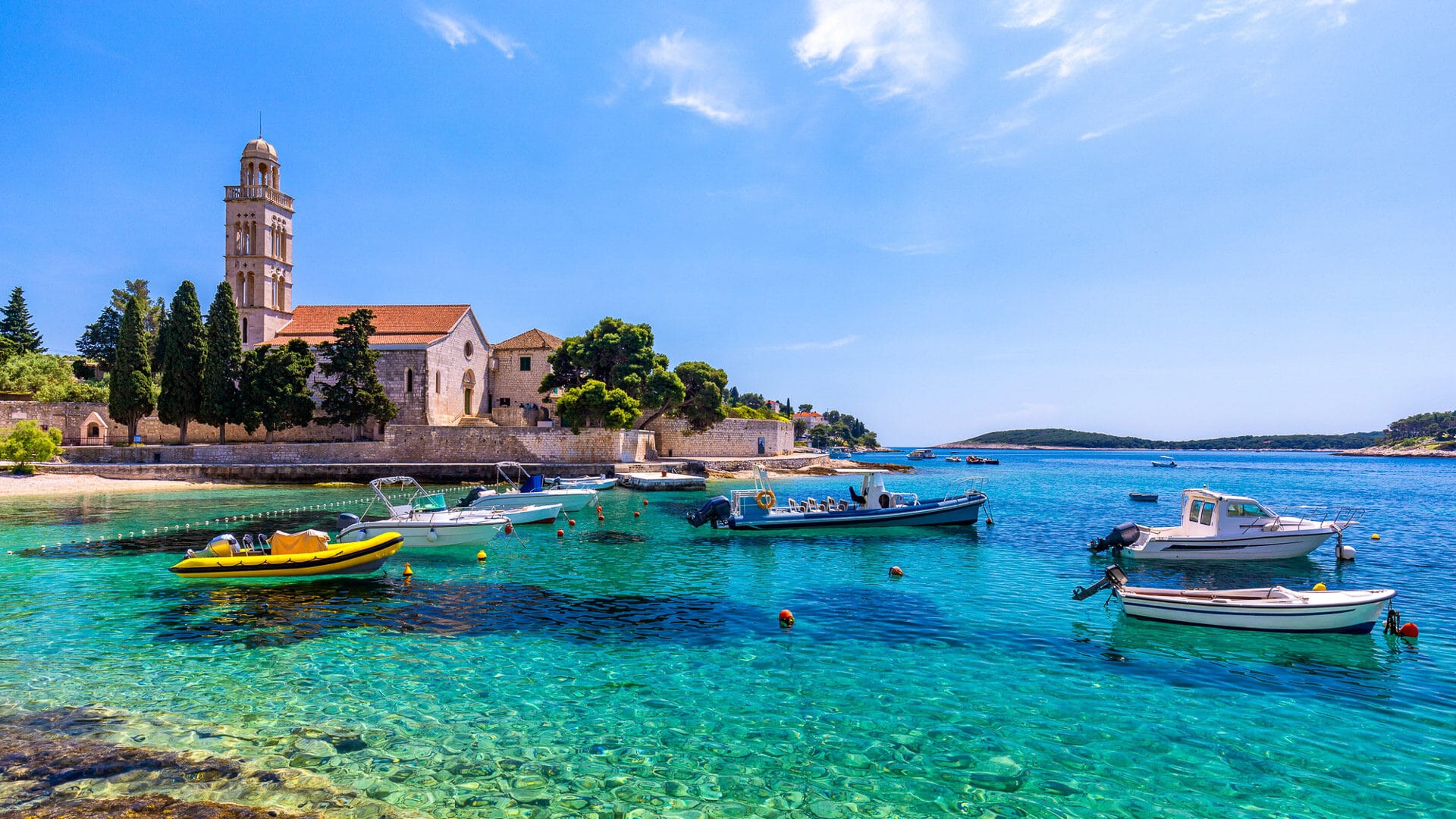 View at amazing archipelago with boats in front of town Hvar, Croatia. Harbor of old Adriatic island town Hvar. Popular touristic destination of Croatia. Amazing Hvar city on Hvar island, Croatia.