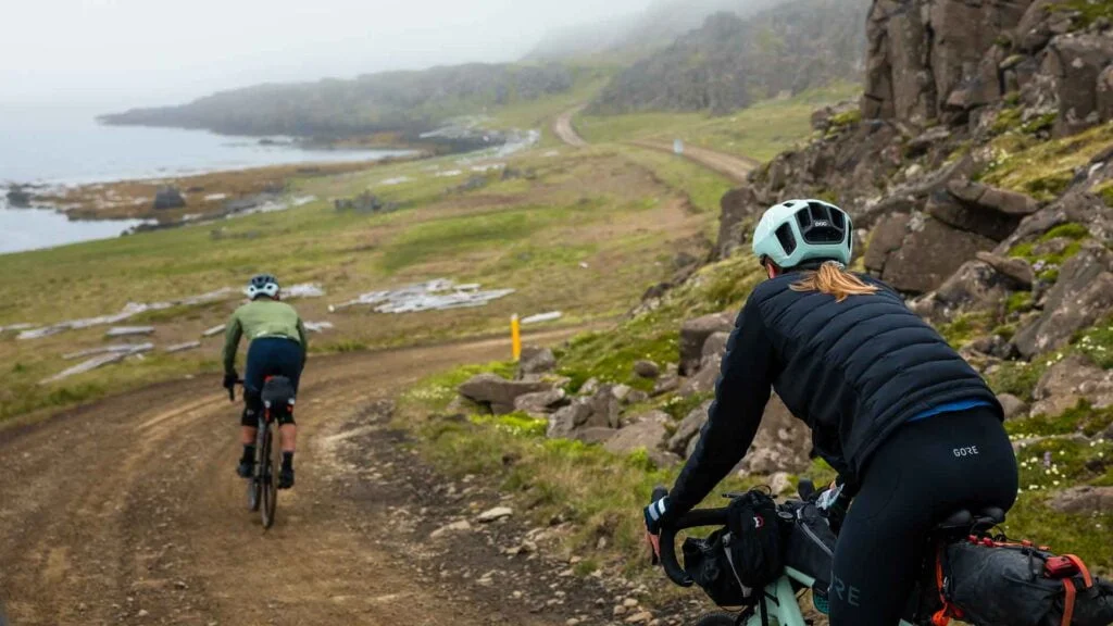 Two cyclists riding gravel in Iceland