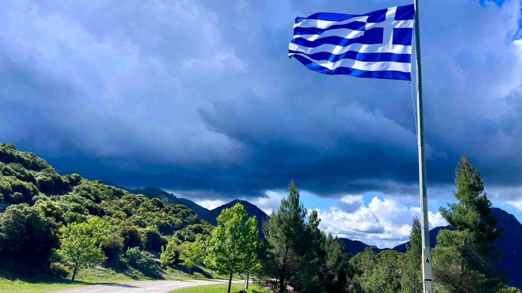 A greek flag flapping in the wind