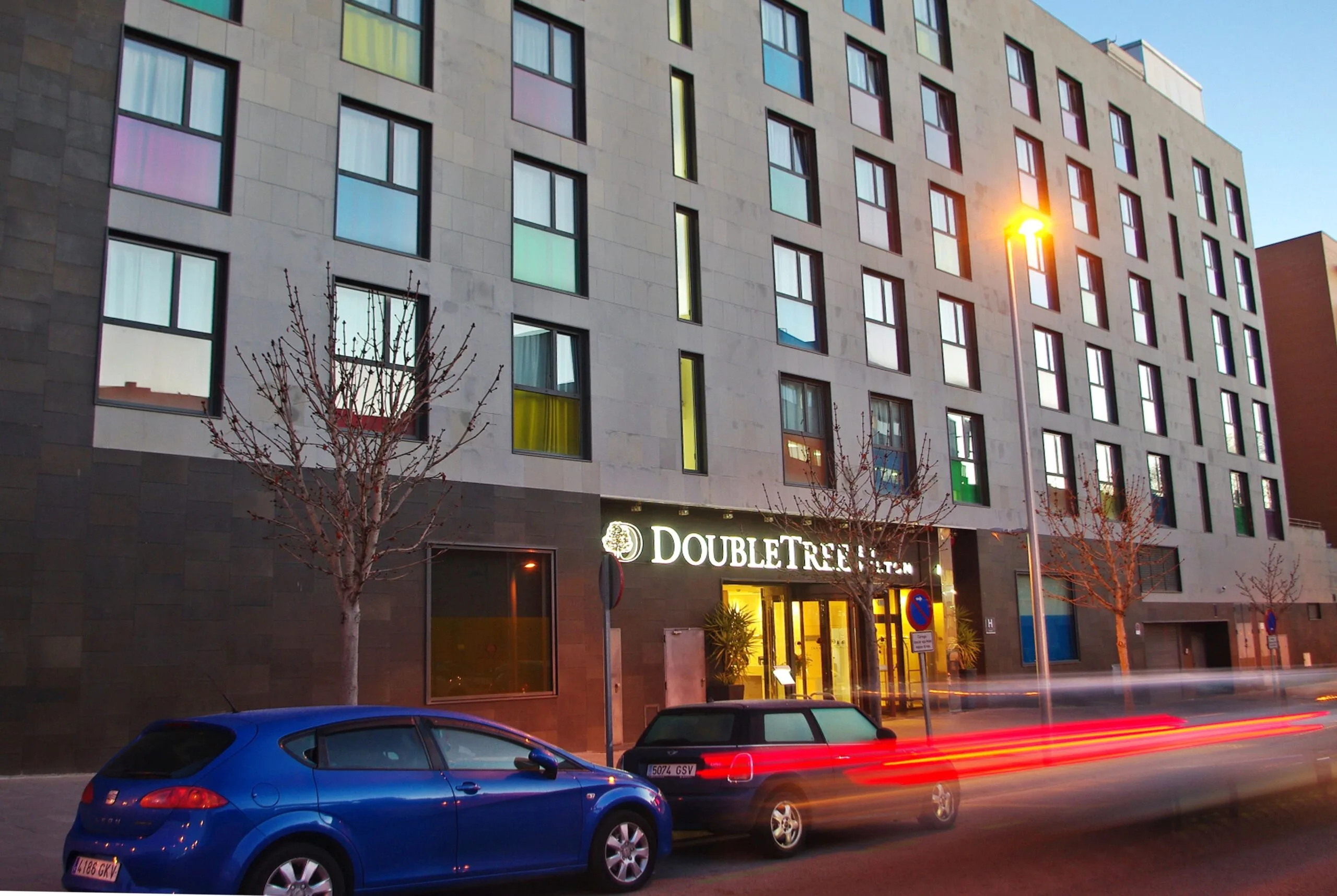 Exterior of DoubleTree by Hilton Girona hotel, modern facade with clean lines in Girona city setting