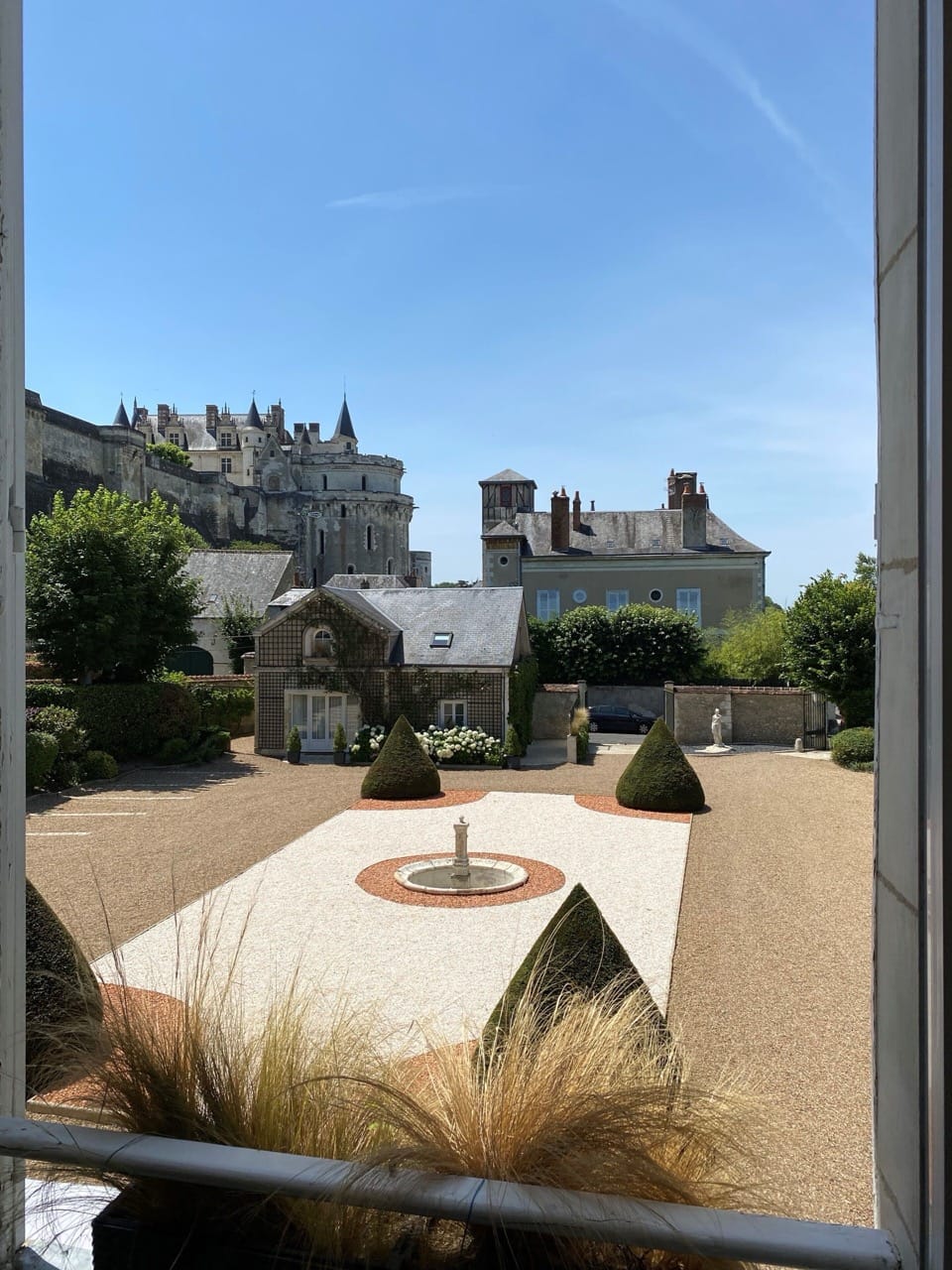 View from Le Manoir Les Minimes Amboise showing sprawling landscape with trees