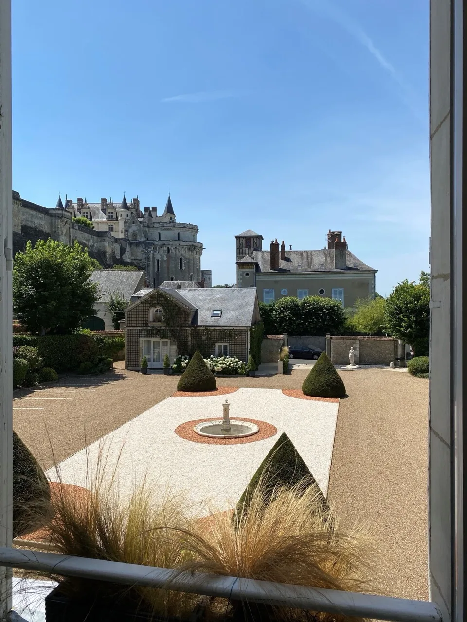 View from Le Manoir Les Minimes Amboise showing sprawling landscape with trees