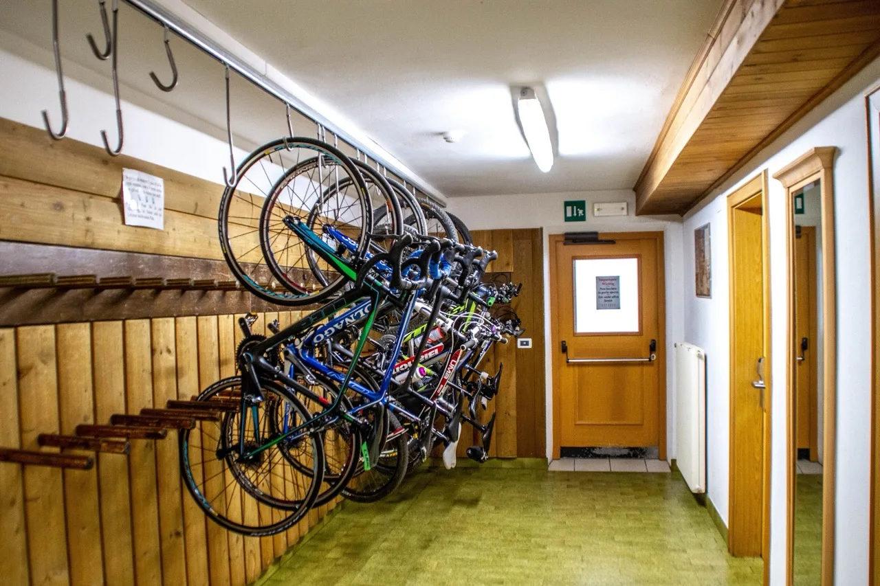 Bike storage at Hotel Gran Fanes in Corvara in Badia with neatly arranged bicycles