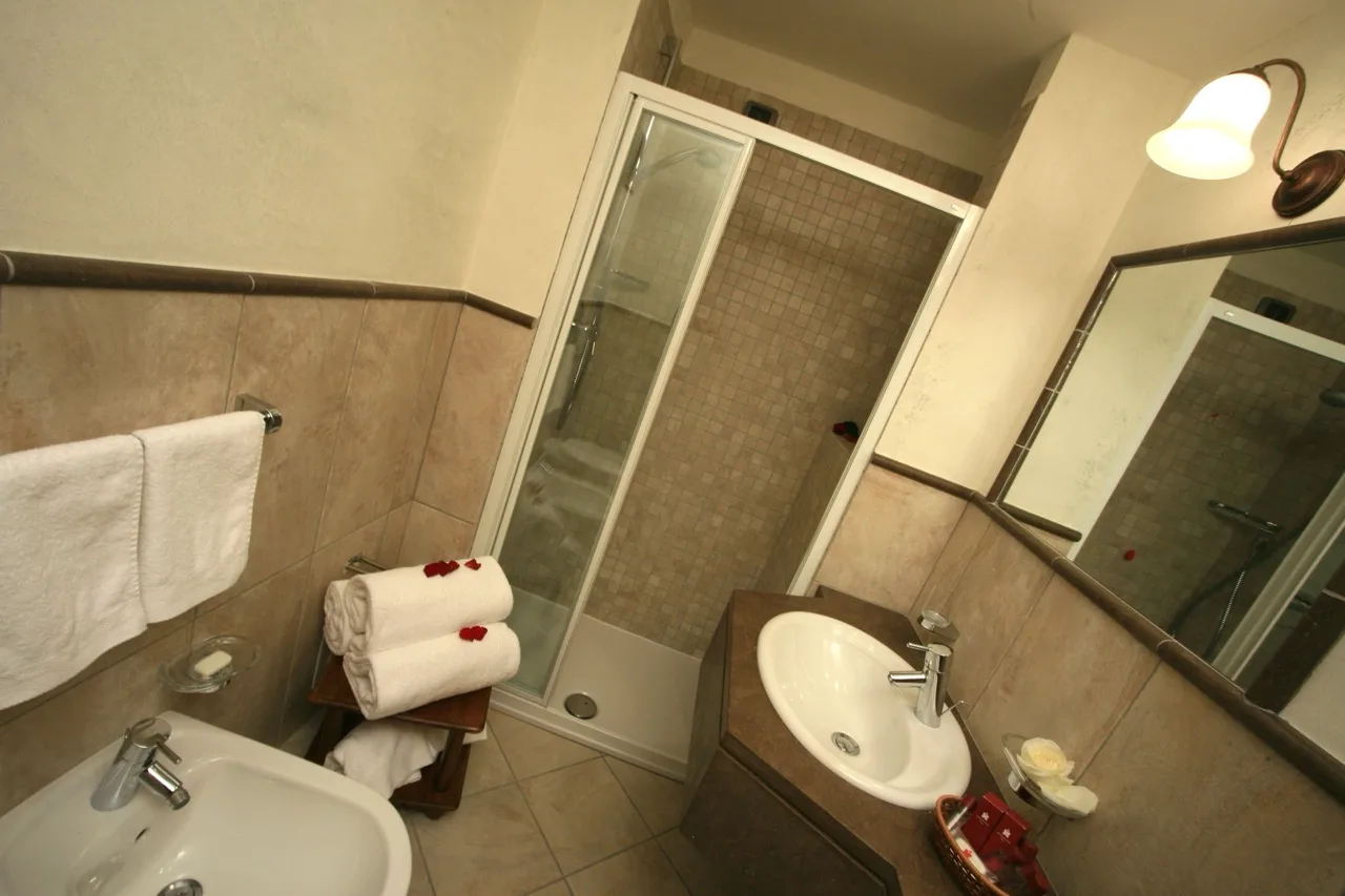 Top-down view of bathroom at Hotel Miramonti in Badia showing fixtures and modern luxury Alpine-style décor