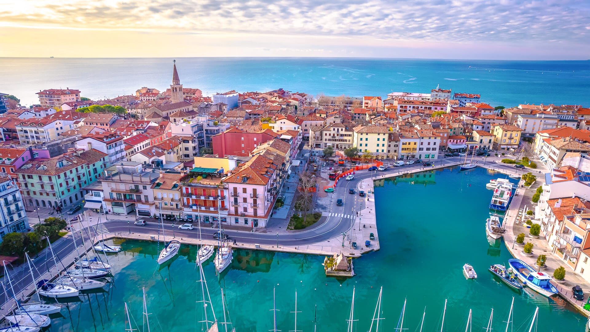 Aerial view of the town of Grado colorful central channel harbor aerial sunset view, Friuli-Venezia Giulia region of Italy
