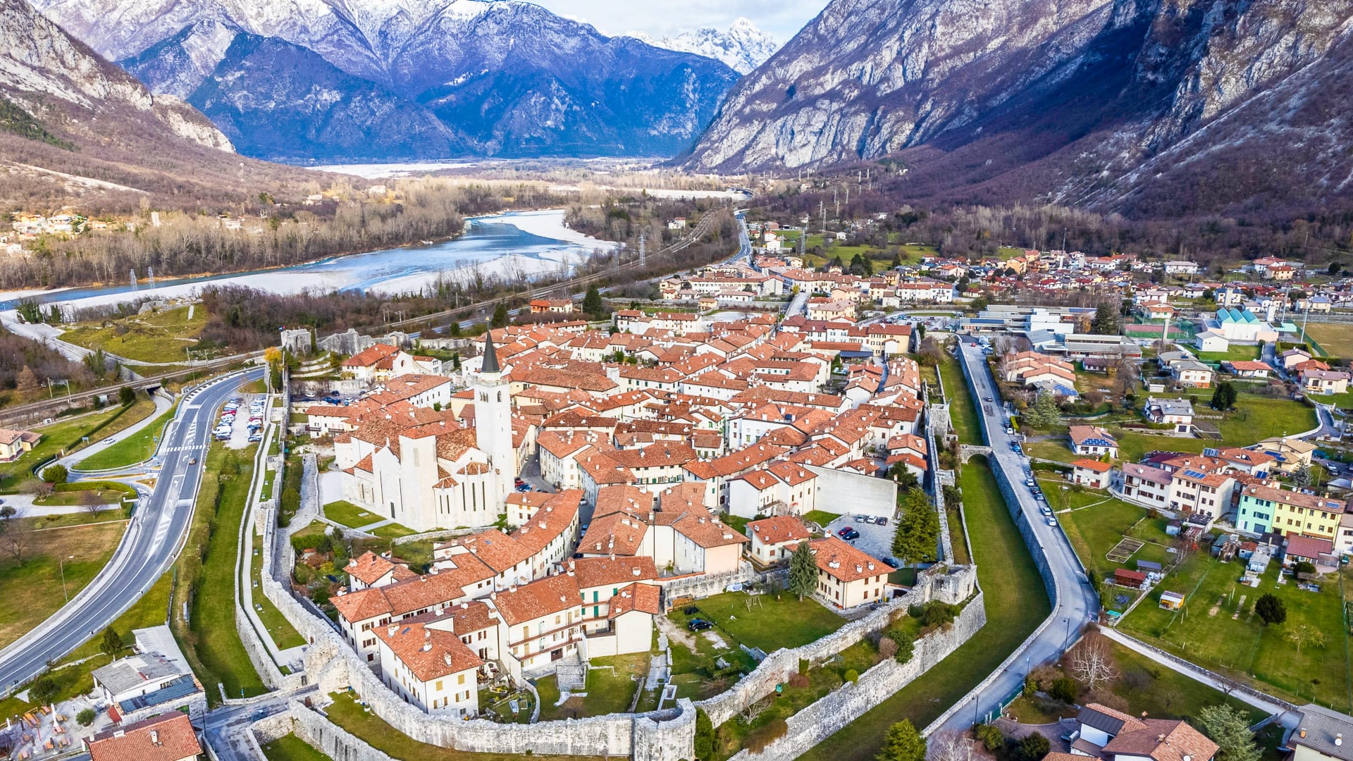 Aerial view of ancient Venzone town surrounded with stone walls