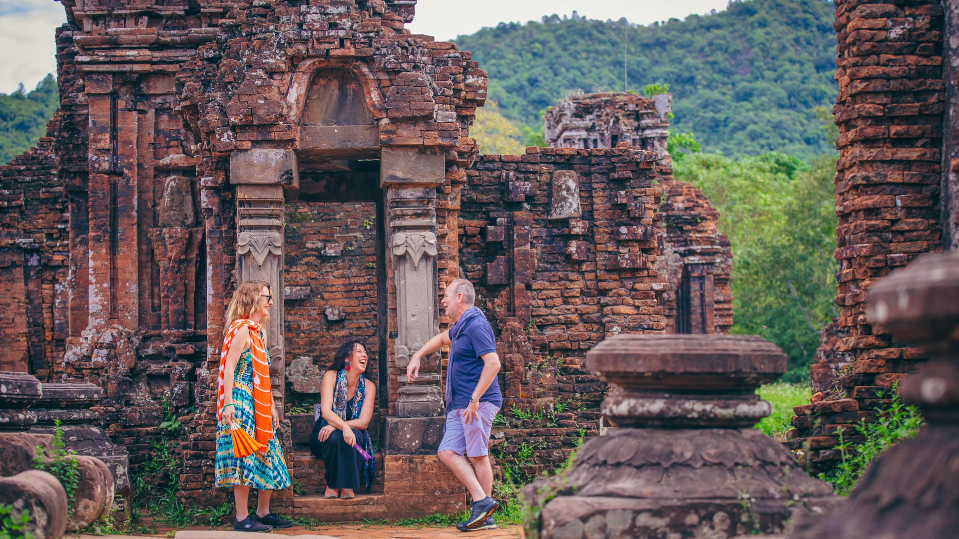 Group of travellers at the ancient temple ruins of My Son, near Hoi An, Vietnam