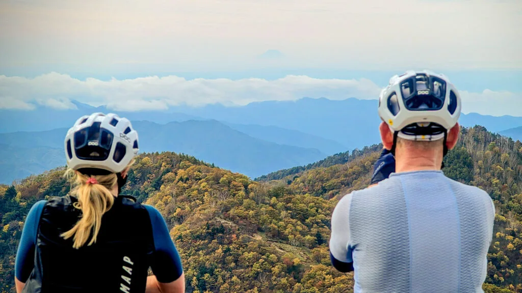 two cyclist admiring the view in japan