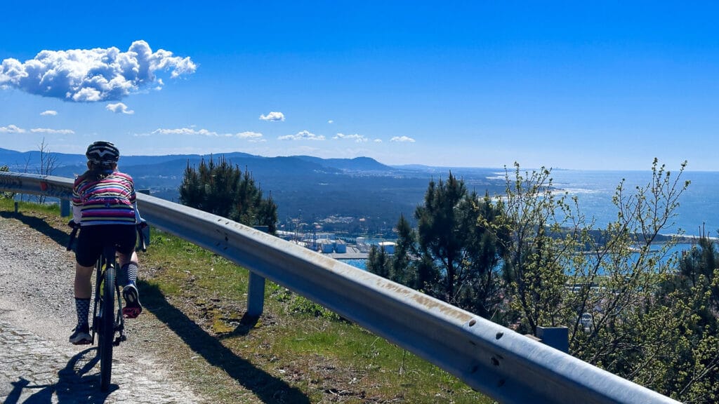 A cyclist admiring the views over Santa Luzia