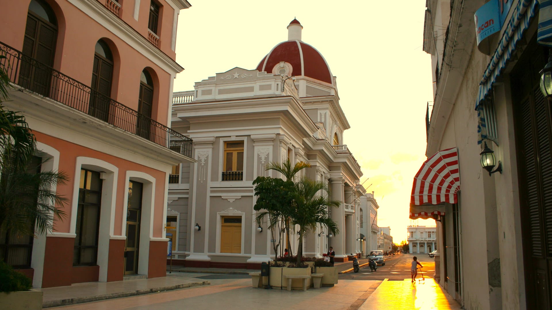 Neoclassical domed building glowing in the evening light in Cienfuegos, Cuba