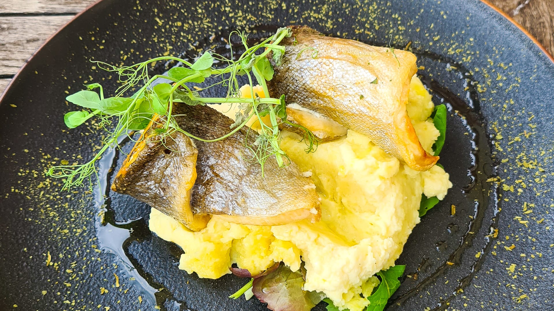 Soca trout on mashed potatoes