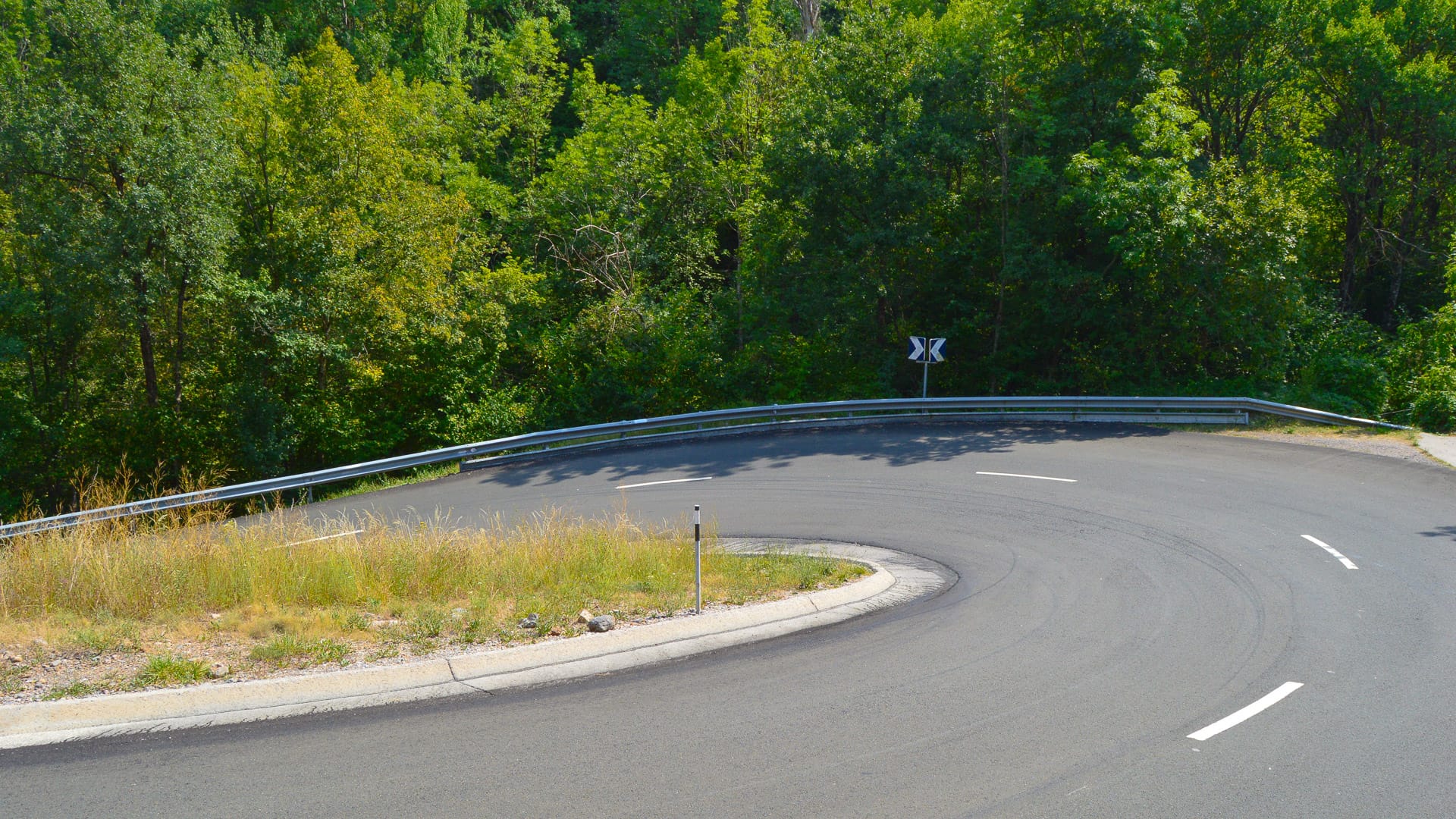 Sharp hairpin bend on Creu de Perves climb in the Pyrenees