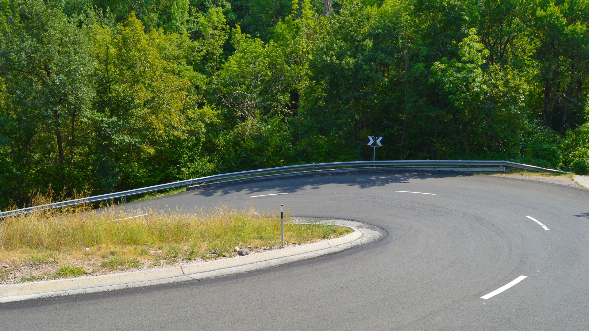 Sharp hairpin bend on Creu de Perves climb in the Pyrenees
