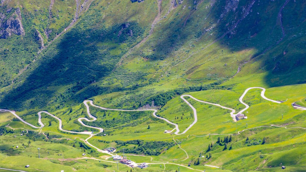 Snaking mountain road crossing the pass of Pordoi in the Italian dolomites