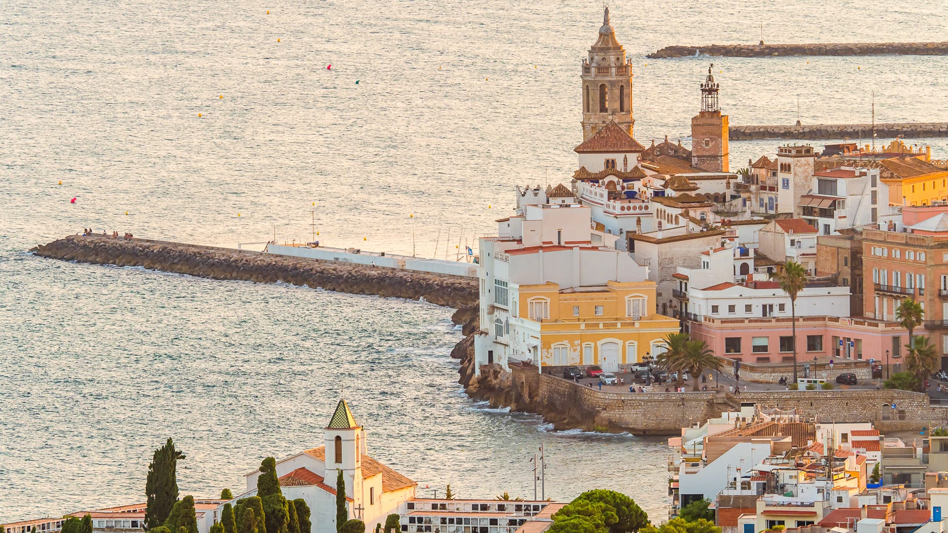 Old town and seafront of Sitges with Sant Bartomeu i Santa Tecla church, Costa Barcelona, Catalonia