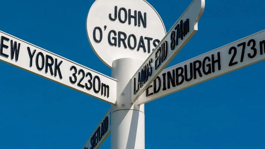 The milepost sign at John O Groats in Scotland on the most north eastern tip of the UK