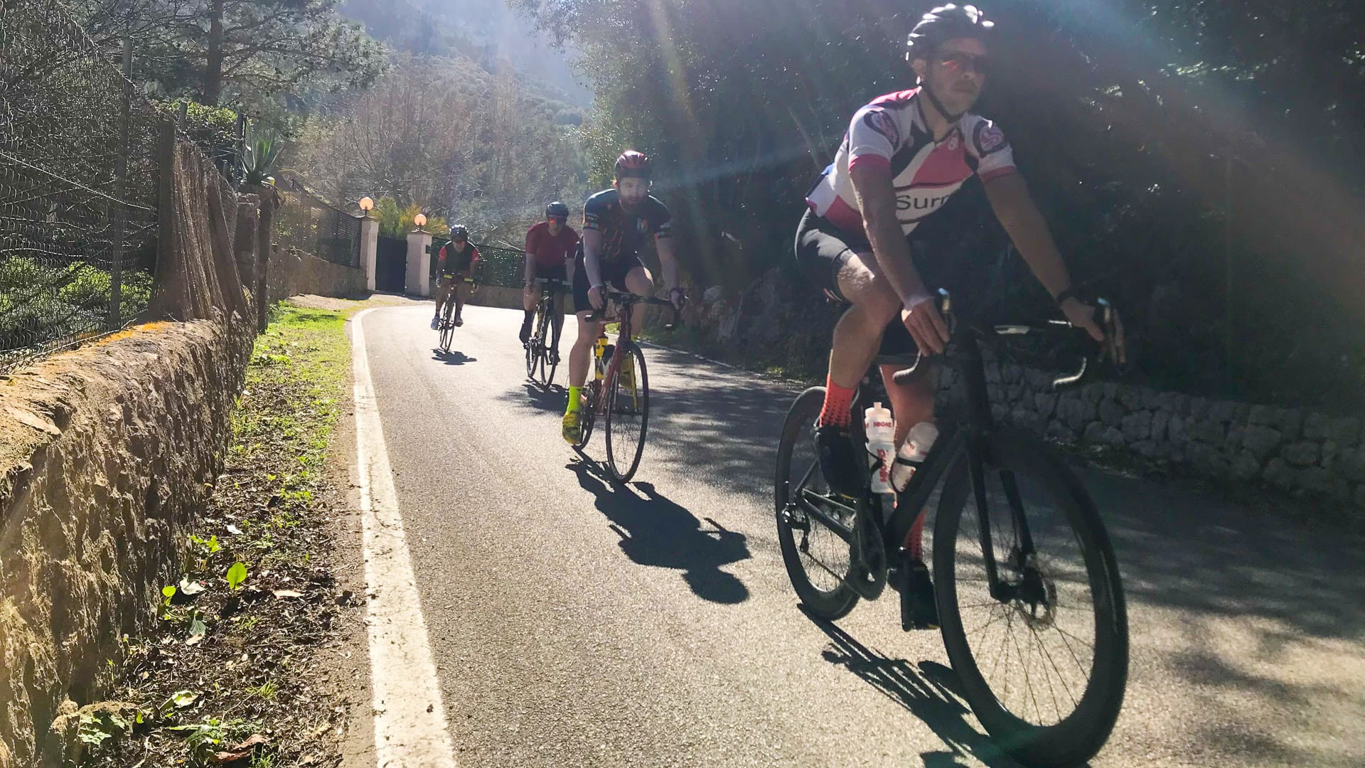 Cyclists riding the roads of Mallorca 312 route
