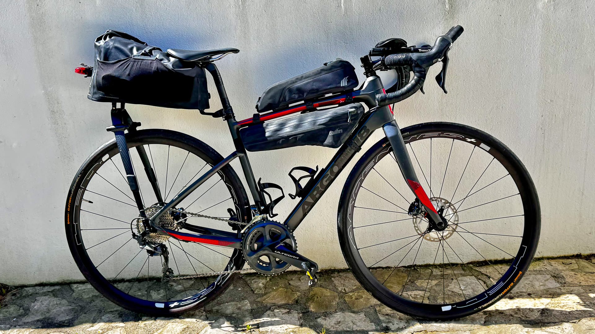 Fully loaded endurance road bike prepared for a Desertus Bikus adventure