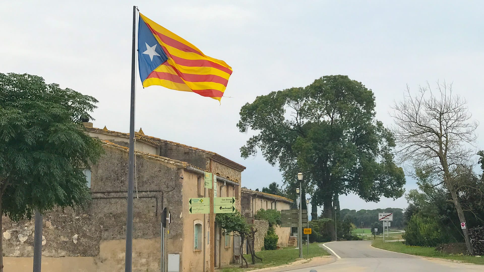Small village with large Catalan flag flying