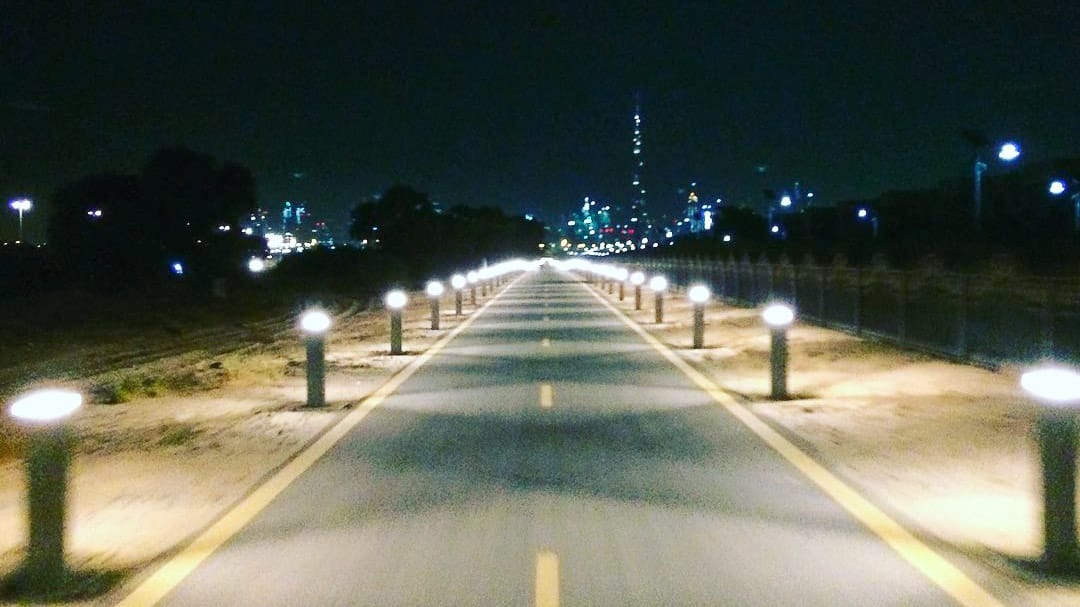Riding towards the Burj Khalifa on District 1 Cycle Track (Meydan)