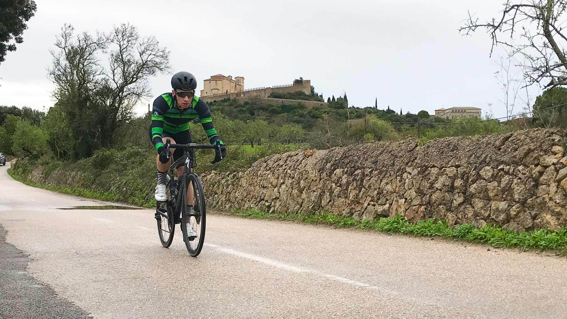 Cyclist riding from Arta towards Ermita de Betlem monastery