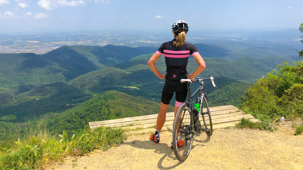 Cyclist at the summit of the legendary cycling climb Rocacorba Girona