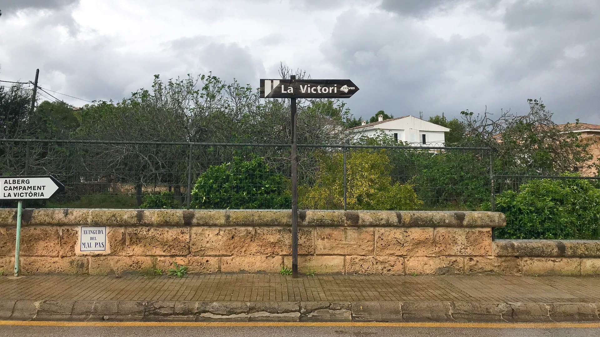Signpost showing the way to la Victoria, Mallorca