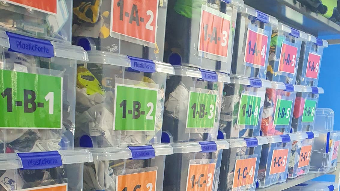 Pro cycling team kits sorted in Pro Cycling Outlet warehouse