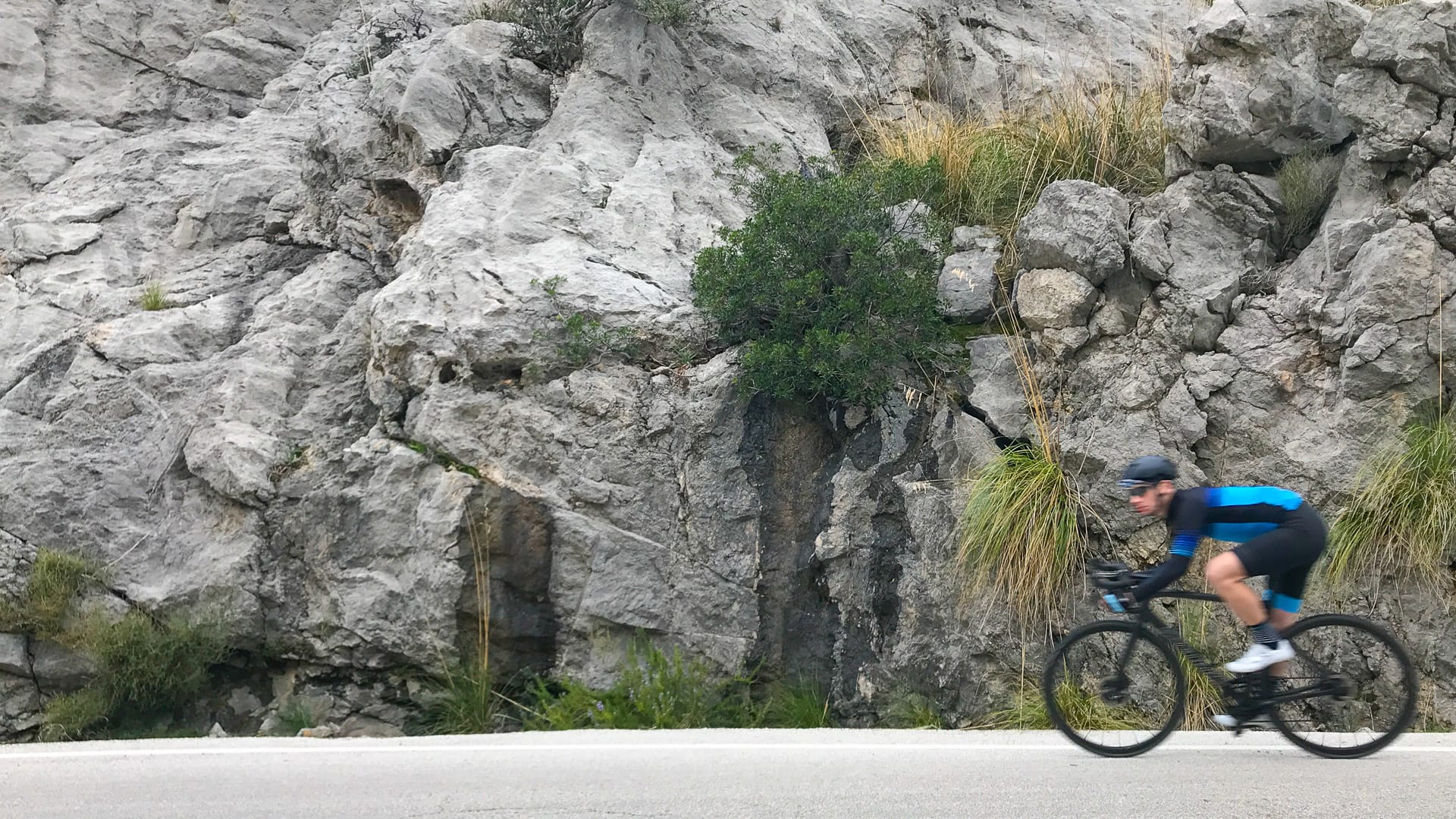 Cyclist enjoying the speed on the Sa Calobra descent!