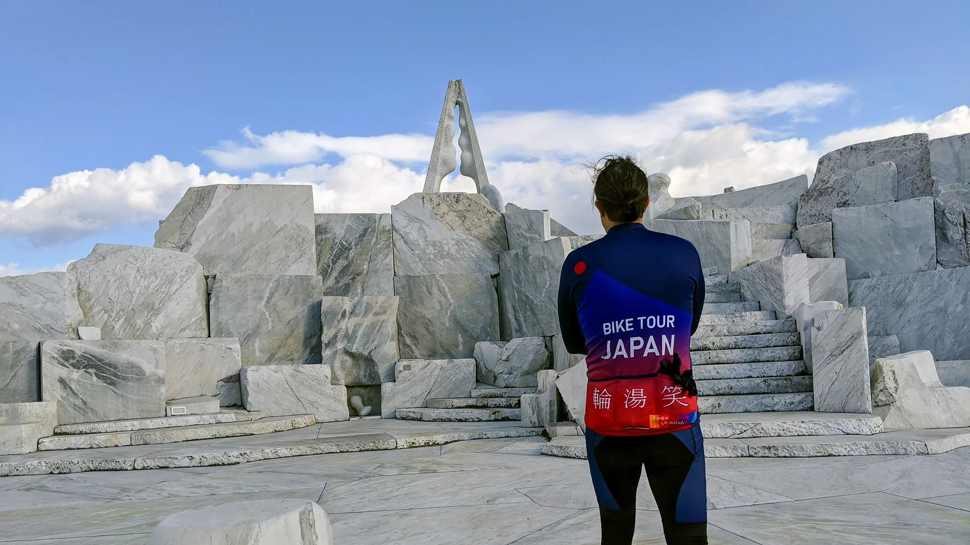 Cyclist looking at sights on the Shimanami Kaido route