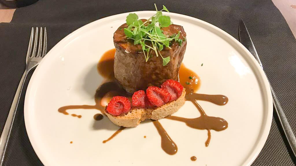 Girona restaurants are superb: beef with biscotti and raspberries