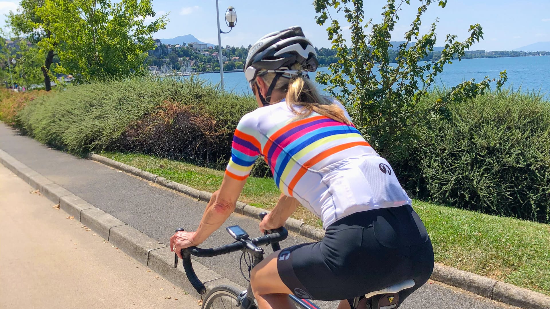Cyclist at Thonon Les Bains by Lake Geneva