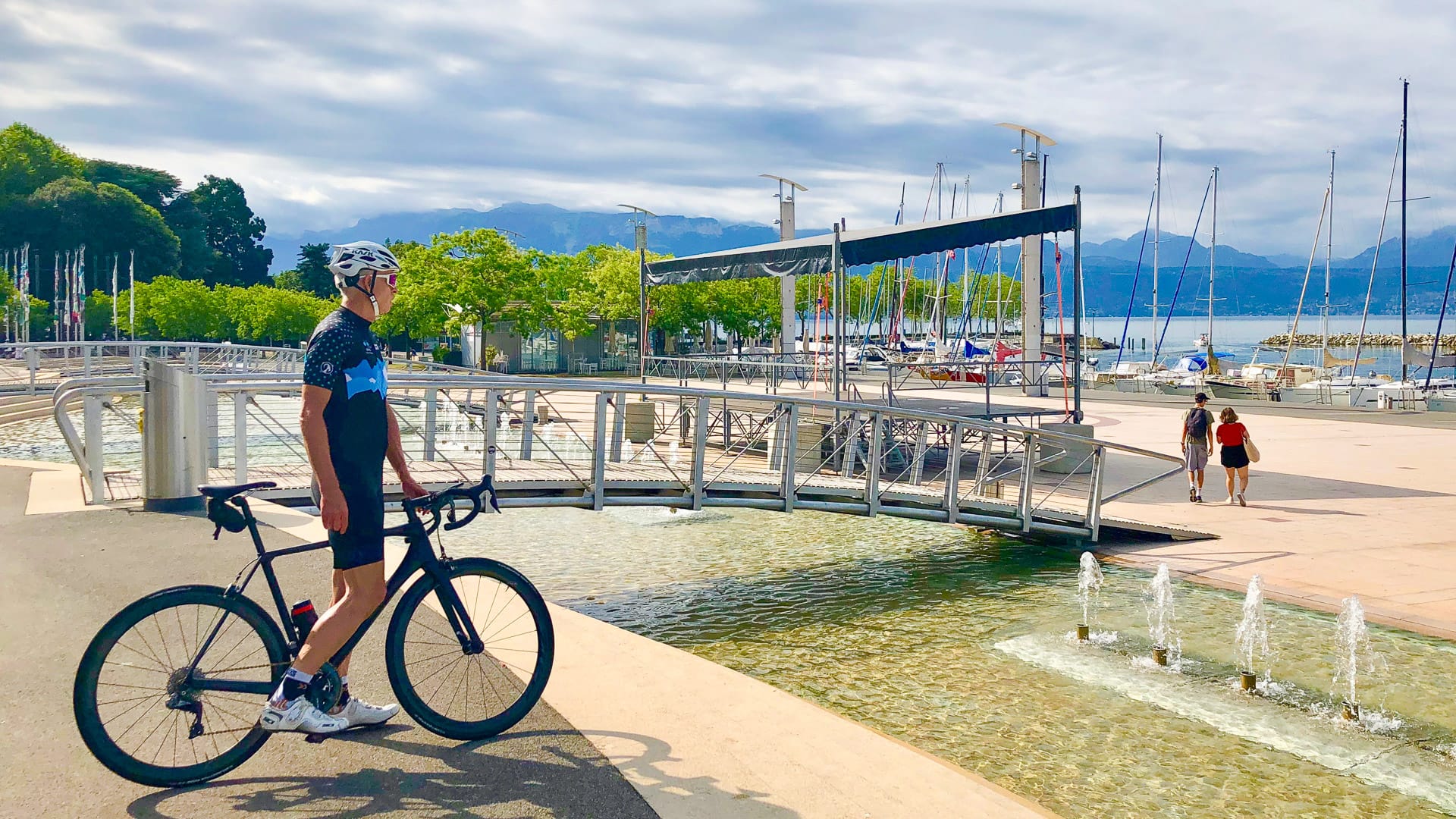 Cyclist by Lake Geneva, Switzerland
