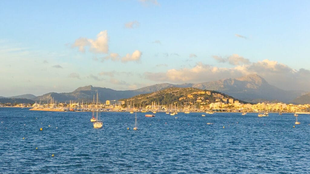 View of Port de Soller harbour and coastline, one of the most beautiful places to stay in Mallorca