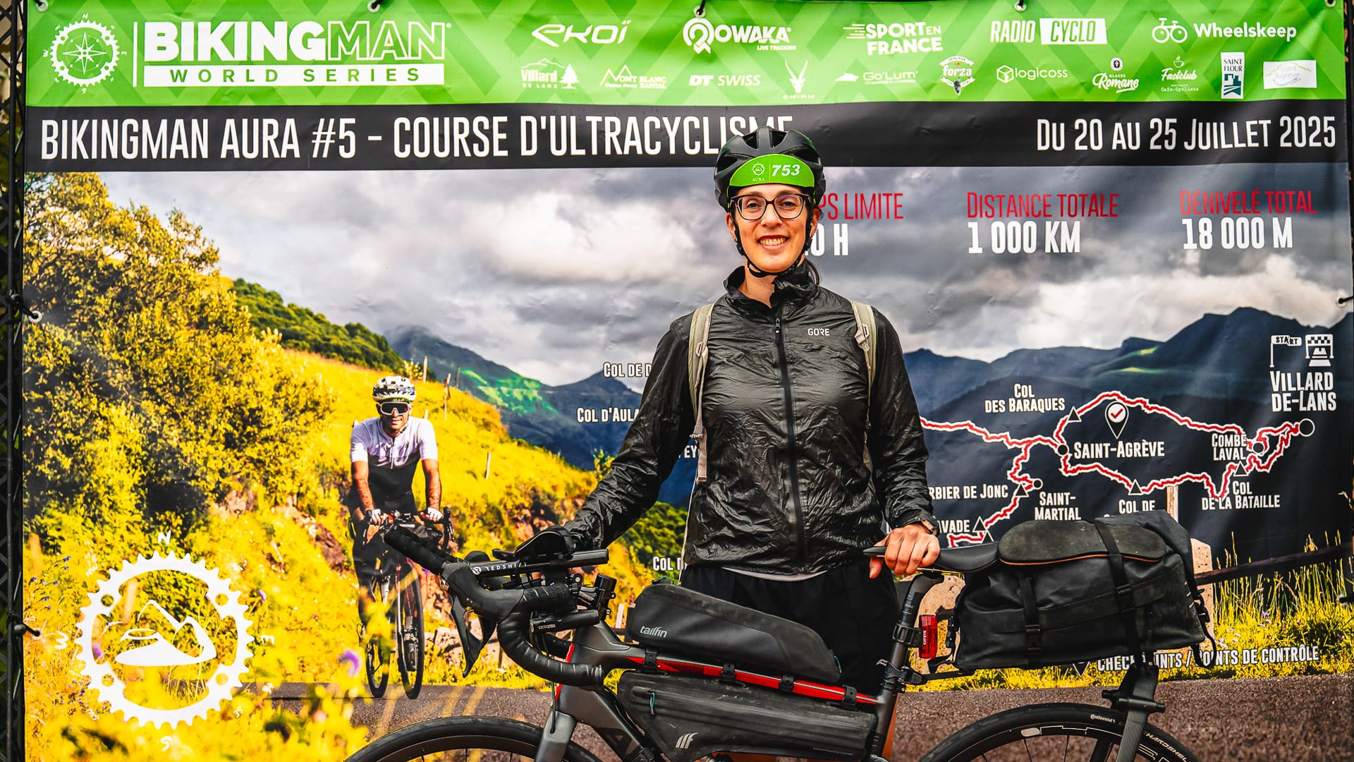 Cyclist completing bike and gear check-in at BikingMan AURA event in Auvergne-Rhône-Alpes France