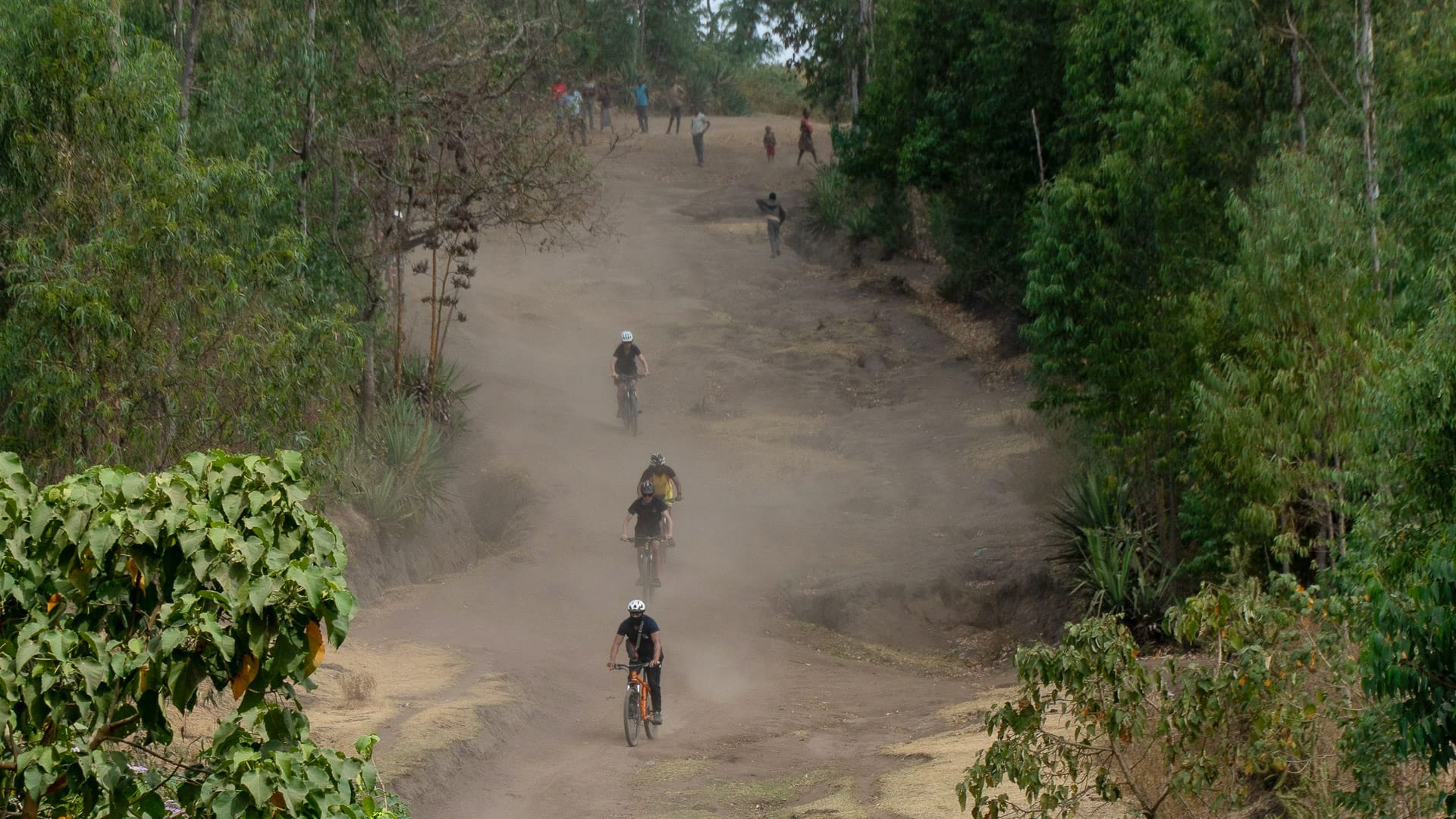 Cyclists riding the hills in western Sidama