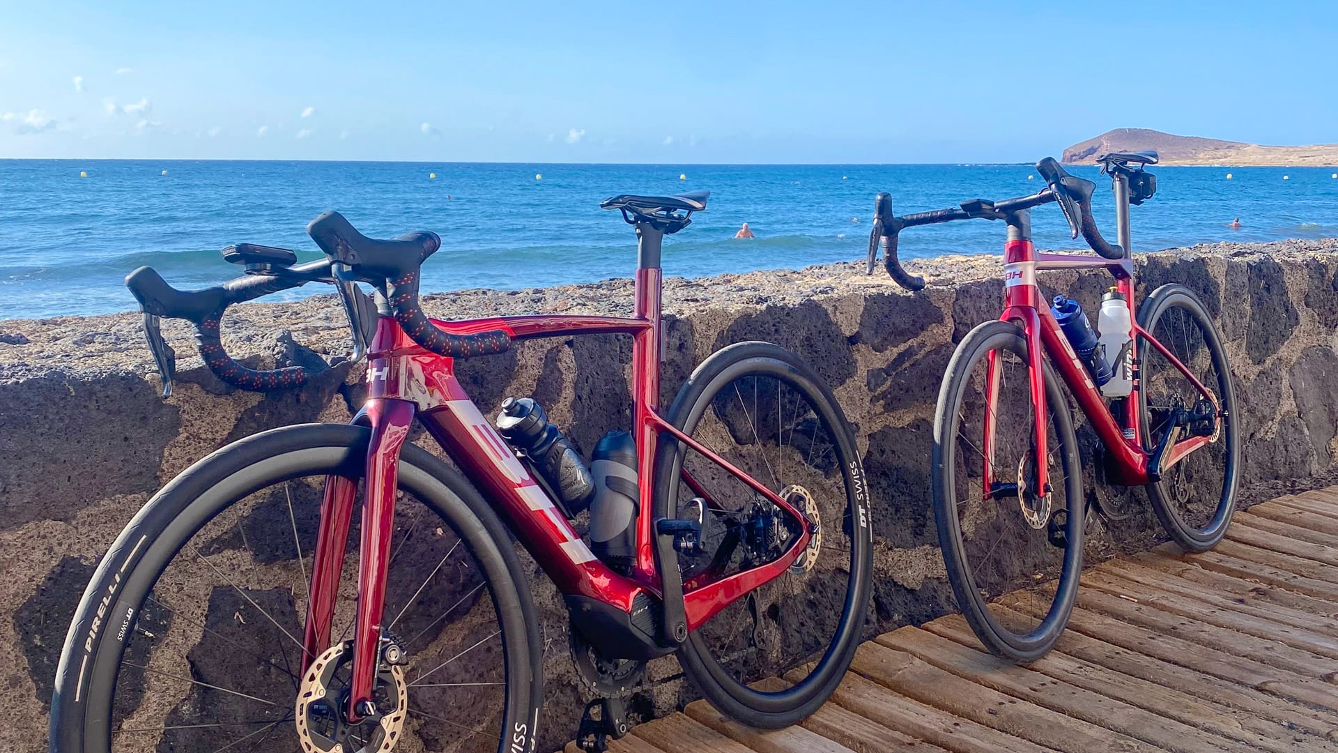 Road bikes resting by the sea during a Tenerife coastal cycling ride